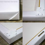 Views of the rear of the canvas art, along with brass hanging grips